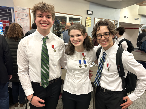 Senior Nick Pires, sophomore Matilda Snyder, and sophomore Patrick D’Amico represent Southern Lehigh at the PMEA District 10 Chorus festival.